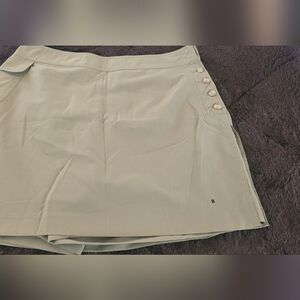 Izod Skort with Button Detail